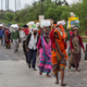 Scores of migrant workers and daily wagers walk back to their villages from Delhi.